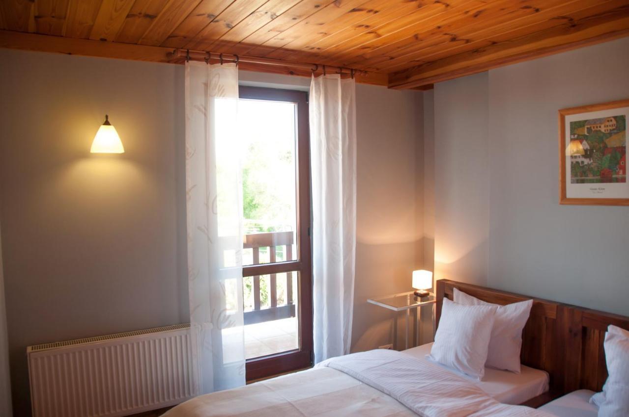 Mazurski Zakatek-Apartamenty Mikołajki Exterior foto